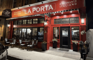 Front view of La Porta with outdoor tables